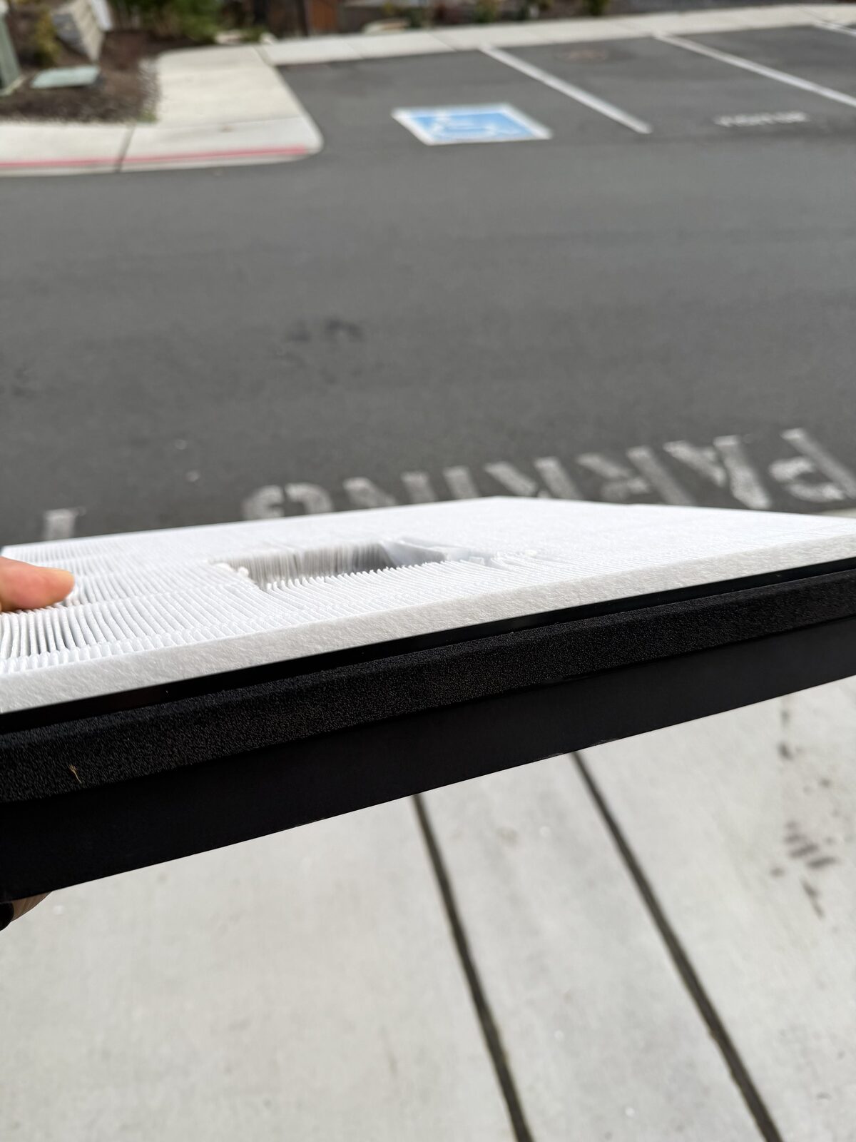 Side view of Lectron cabin air filter showing thin carbon layer