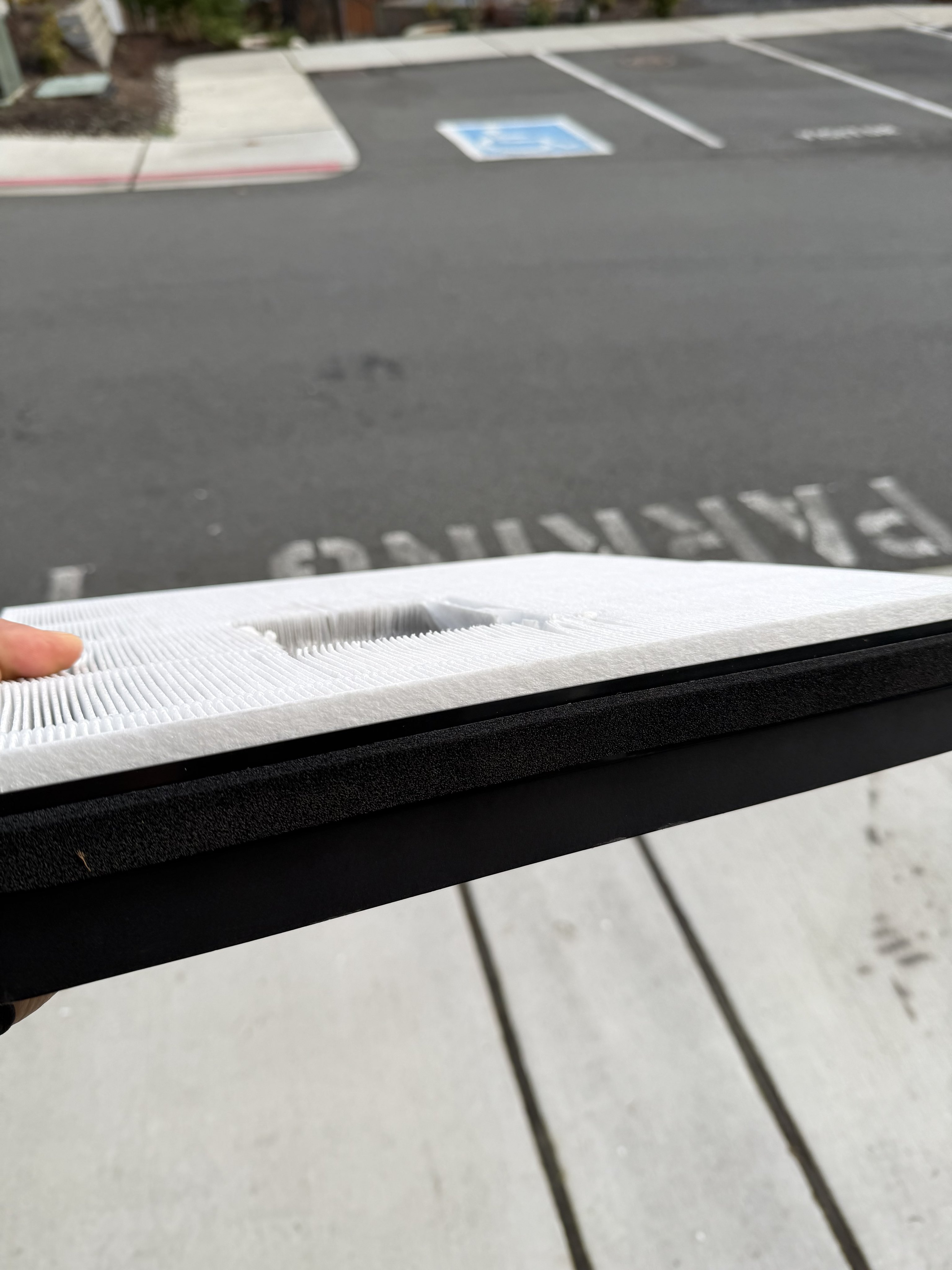 Side view of Lectron cabin air filter showing thin carbon layer