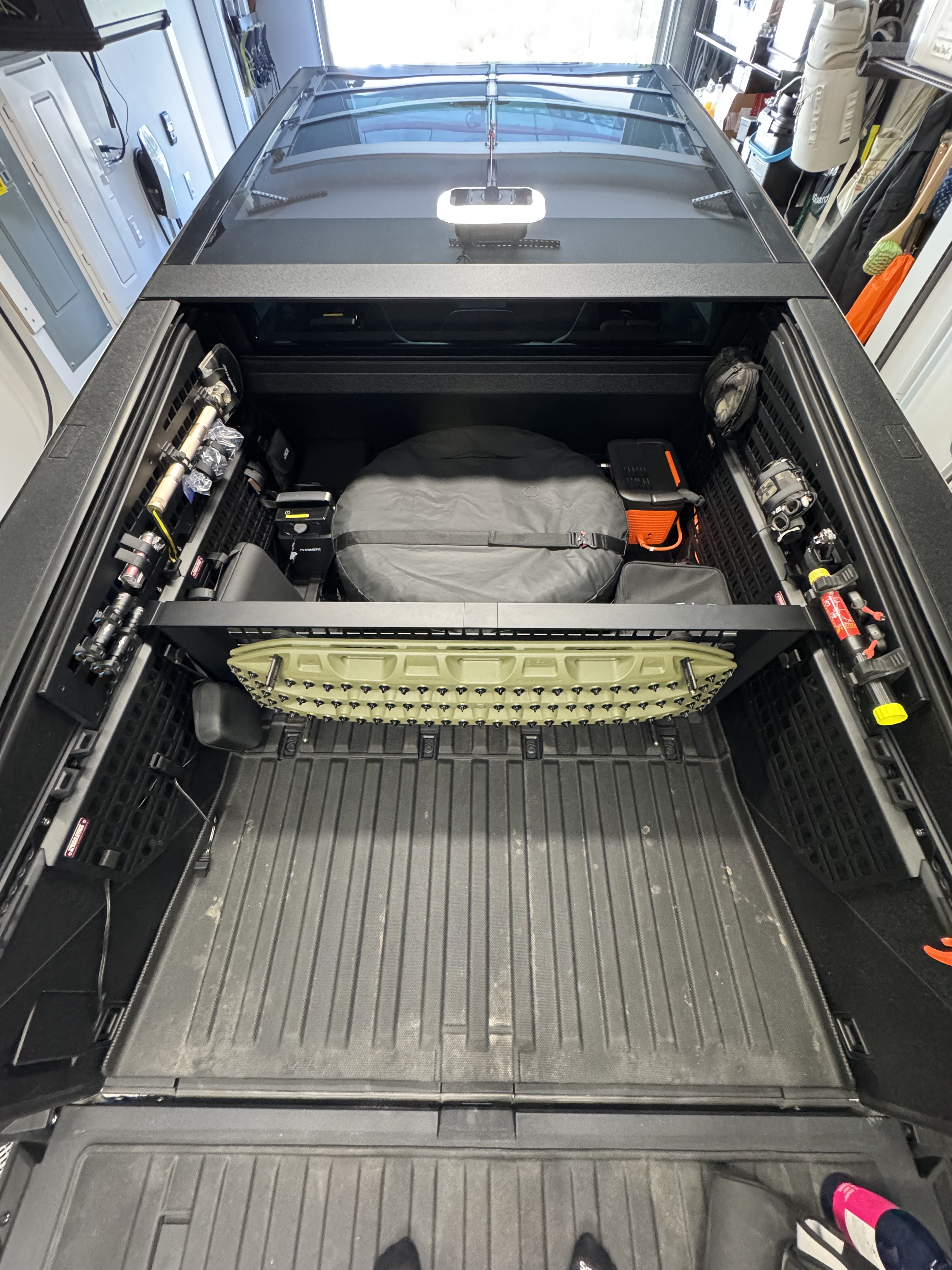 Recovery boards mounted in Cybertruck bed